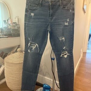 Distressed Blue Jeans